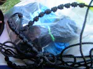 Knotting Rosaries while listening to the concert.